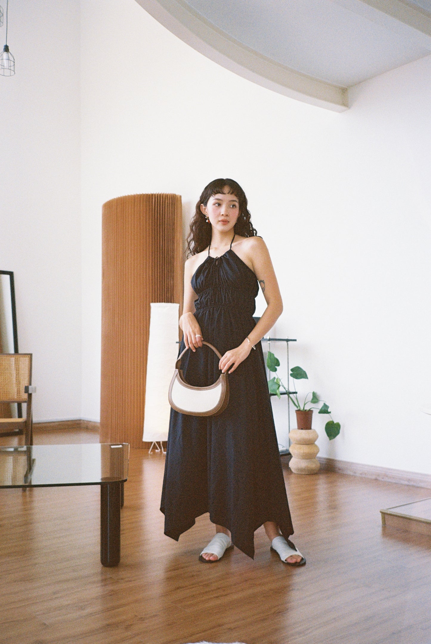 Asymmetrical slip dress in classic black