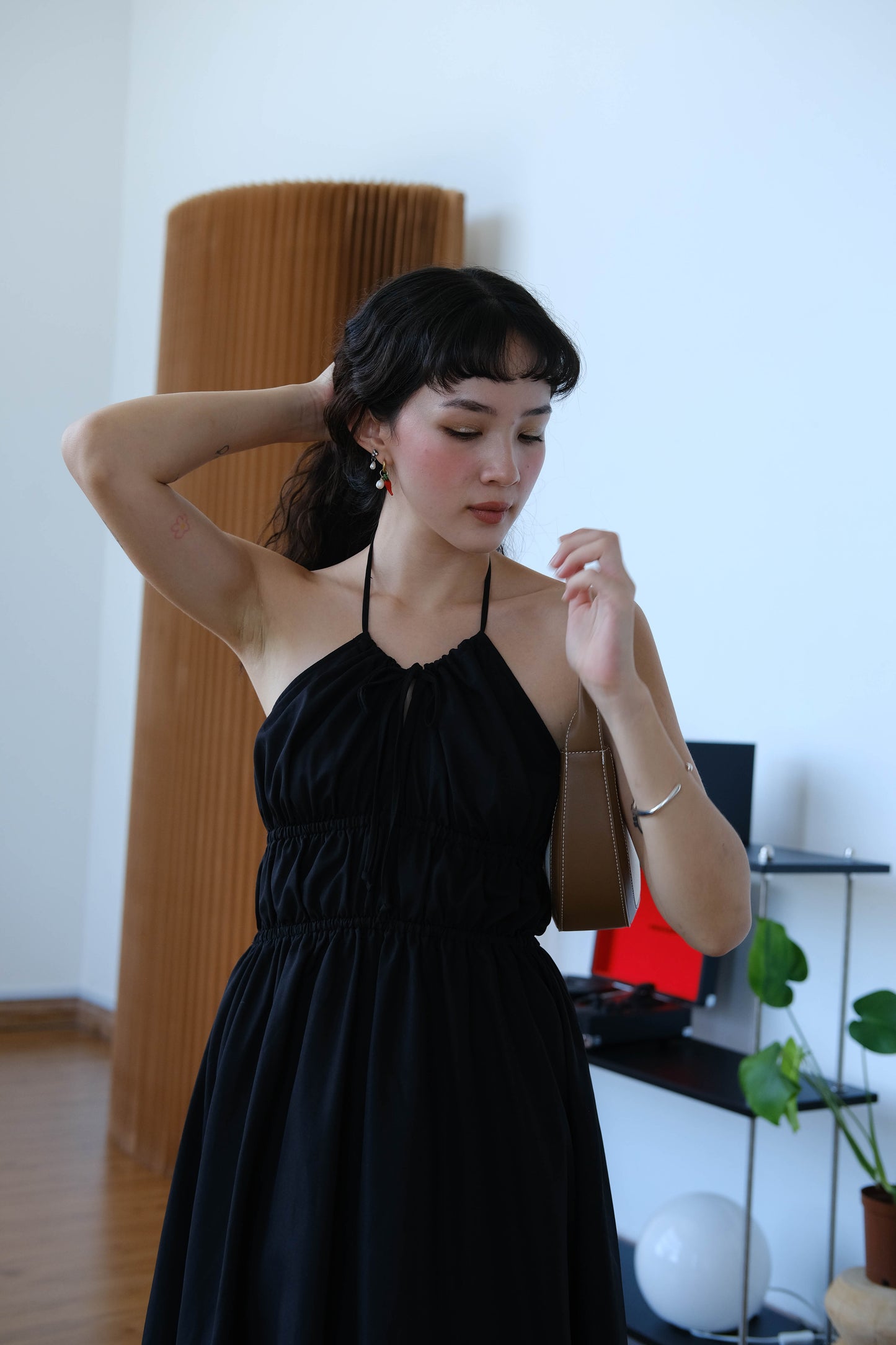 Asymmetrical slip dress in classic black