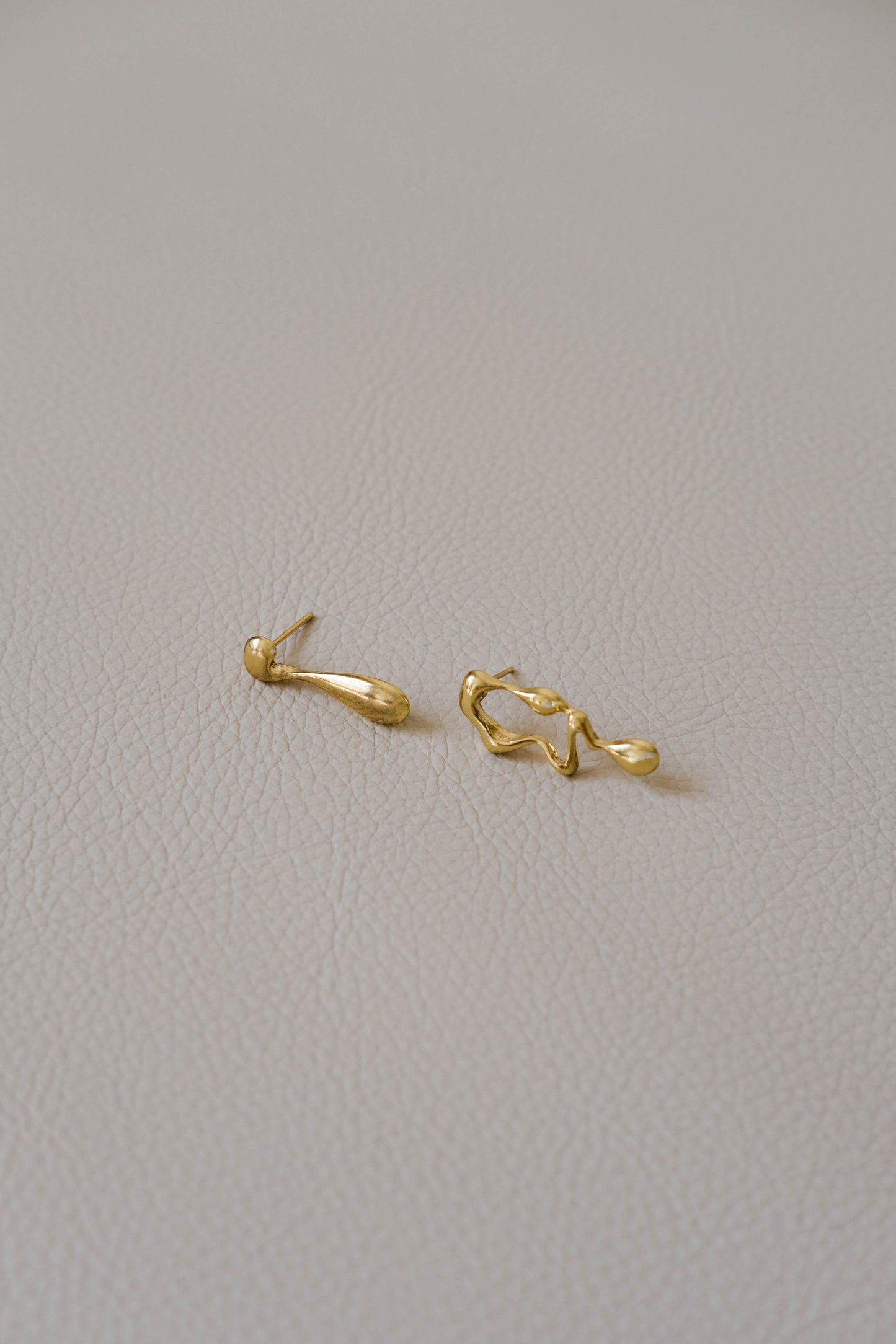 Asymmetrical Lava Earrings In Gold