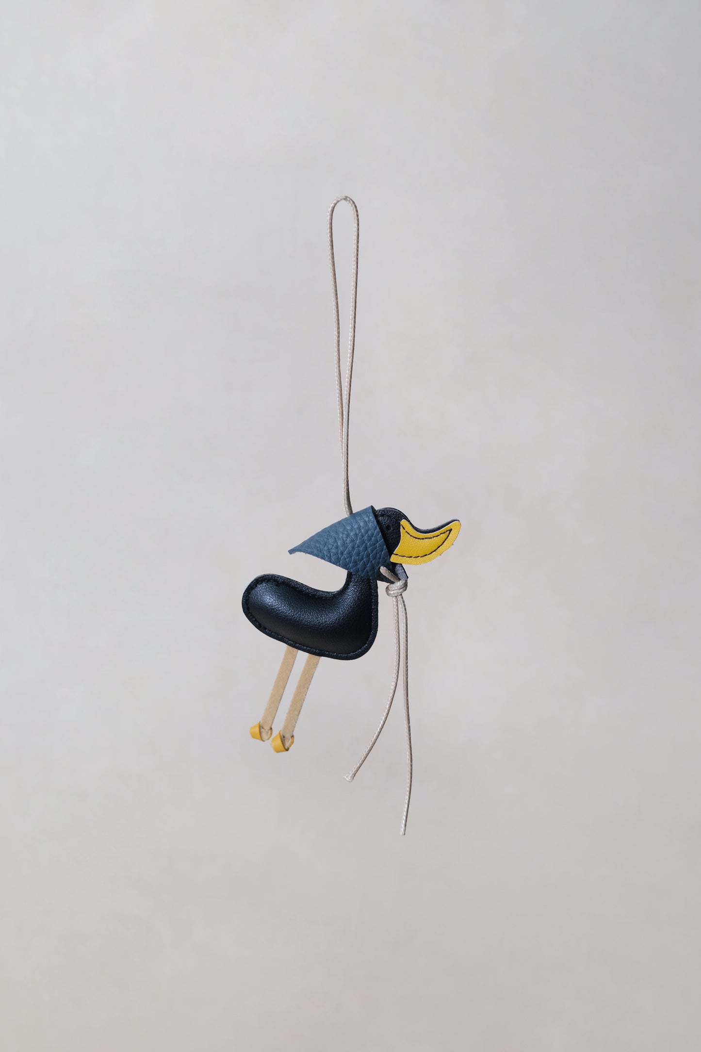 Lucky Duck Charm – Black Duck, Dark Blue Hat