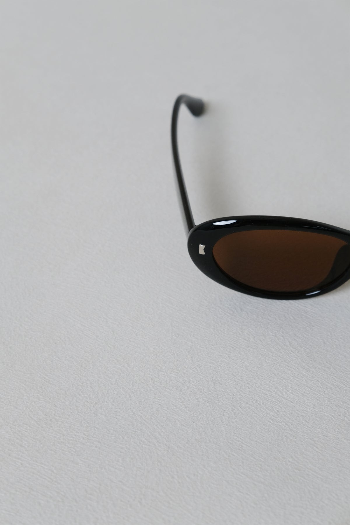 Lumière Oval Sunglasses - Black Frame + Brown Lenses