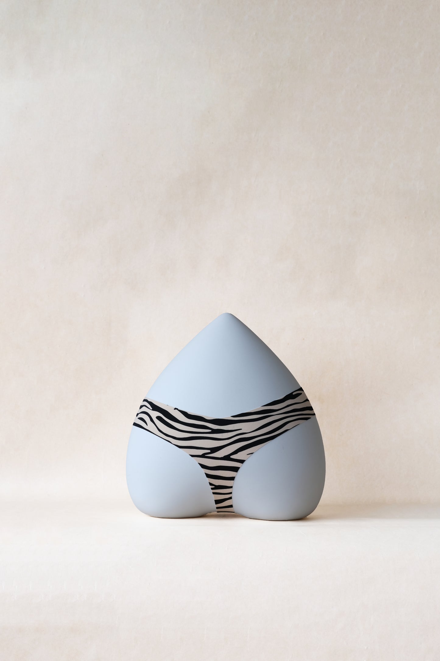 The Sleek Whisper Thong - Neutral Zebra Print