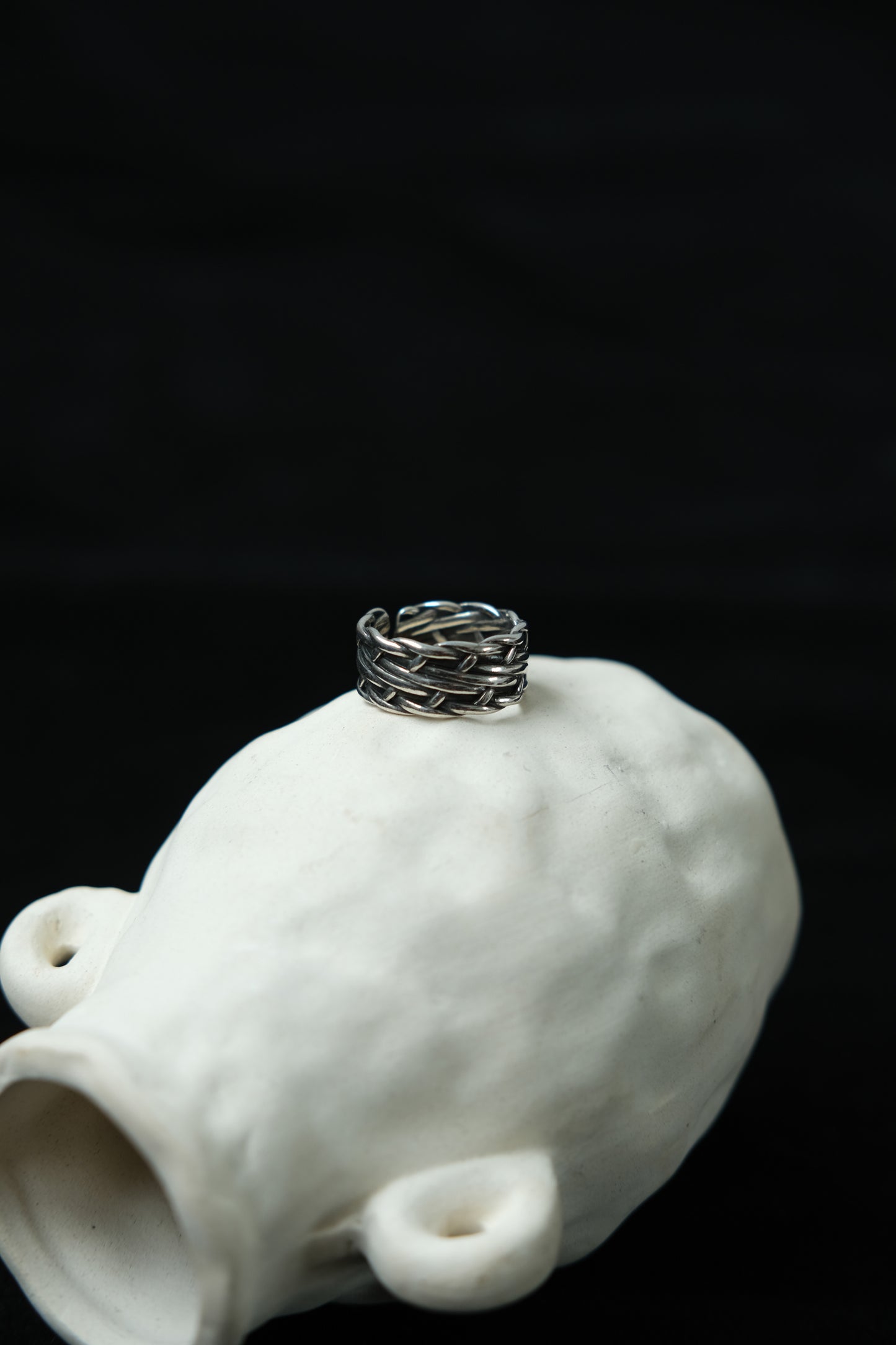 Woven knotted winding cross ring