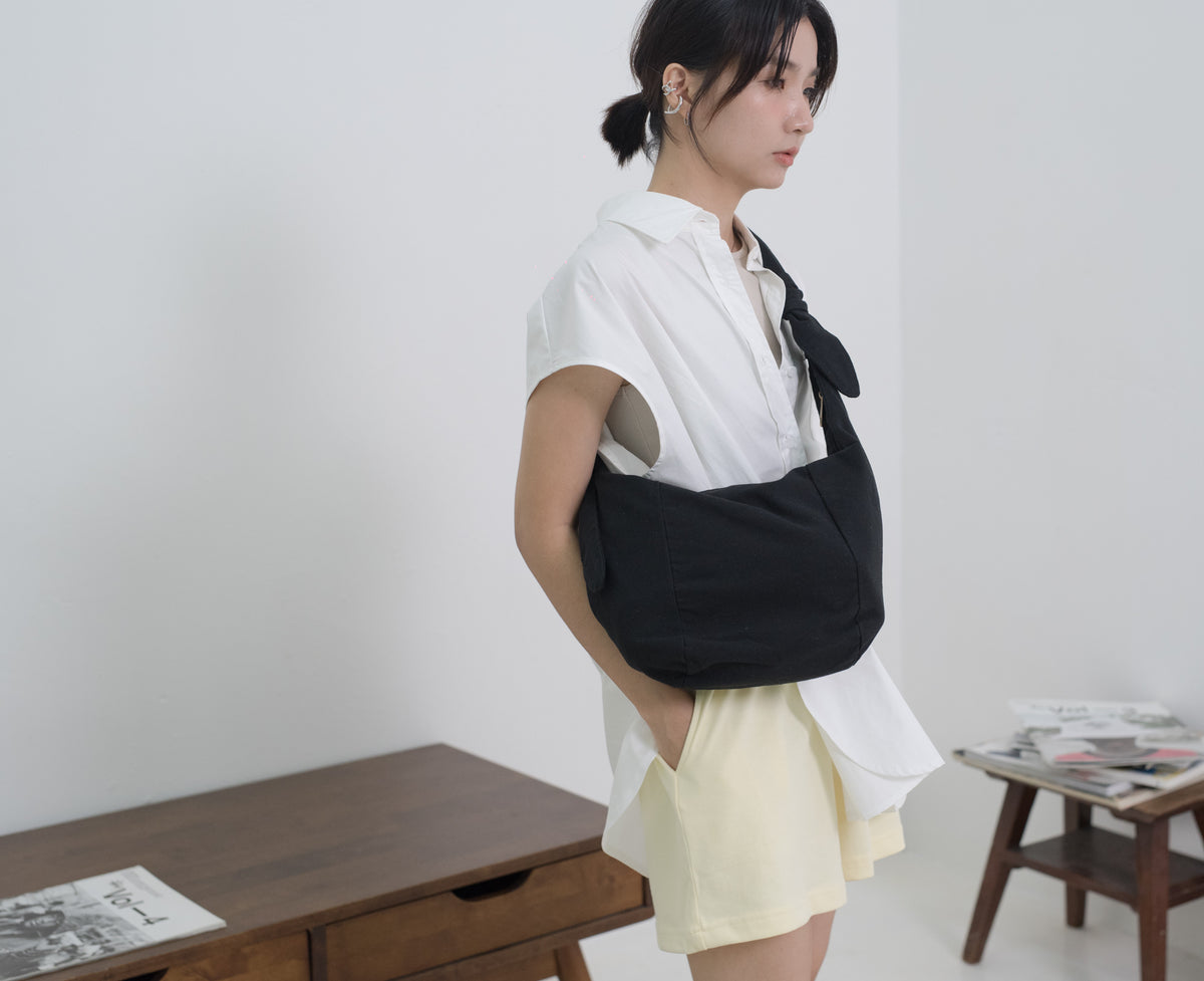 經典黑色帆布打結餃子