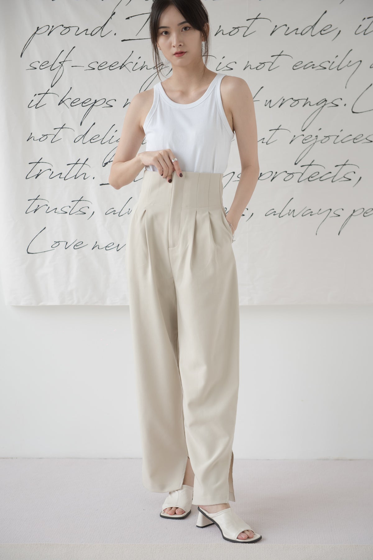 High-waisted wide-legged trousers