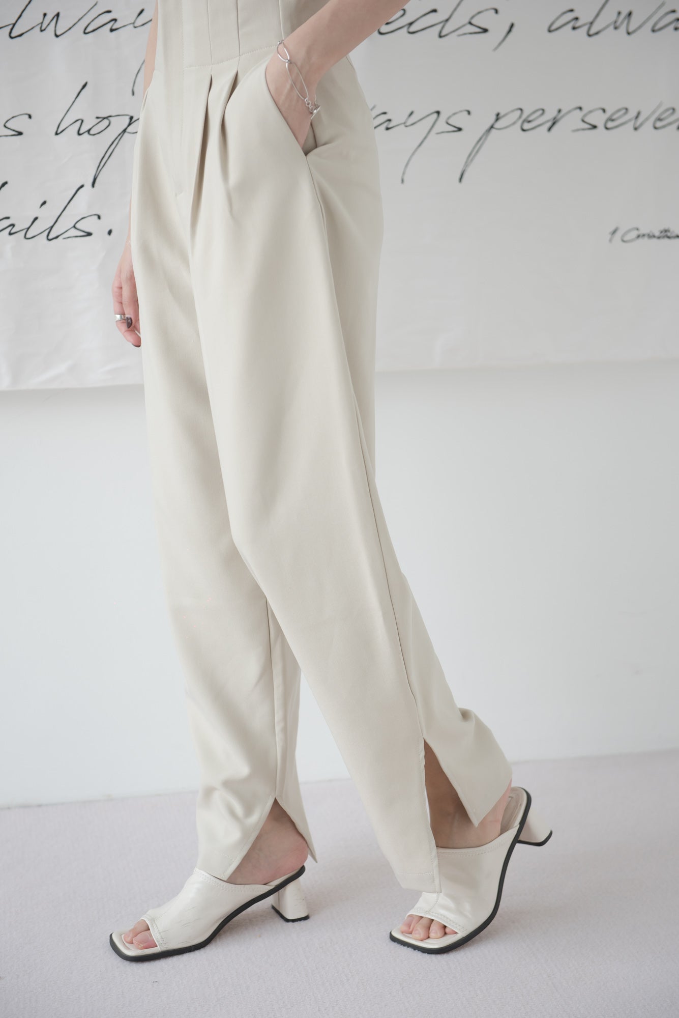 High-waisted wide-legged trousers