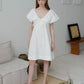 乳白色法式棉亞麻泡泡袖 V 領繫帶連身裙