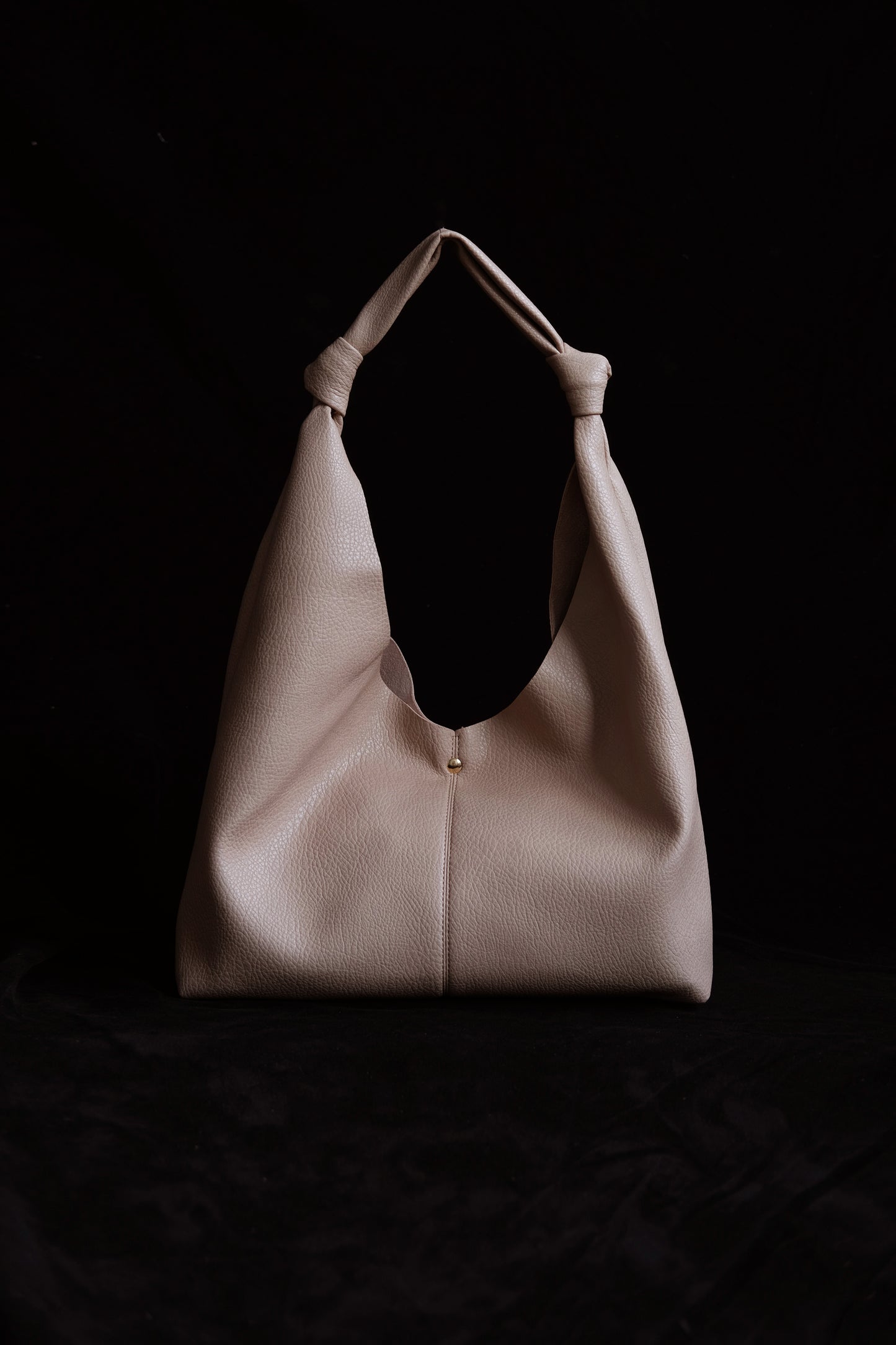 Vintage hand-held shoulder bag in almond