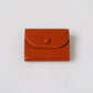 橘色油蠟荔枝紋錢包