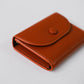 橘色油蠟荔枝紋錢包