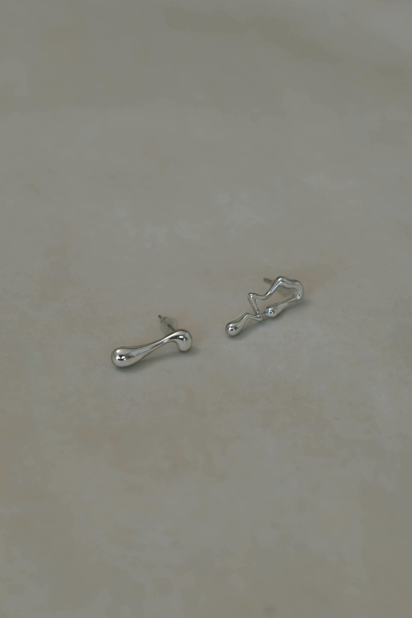 Asymmetrical lava earrings