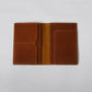Voyage Luxe Genuine Leather Passport Sleeve In Brown