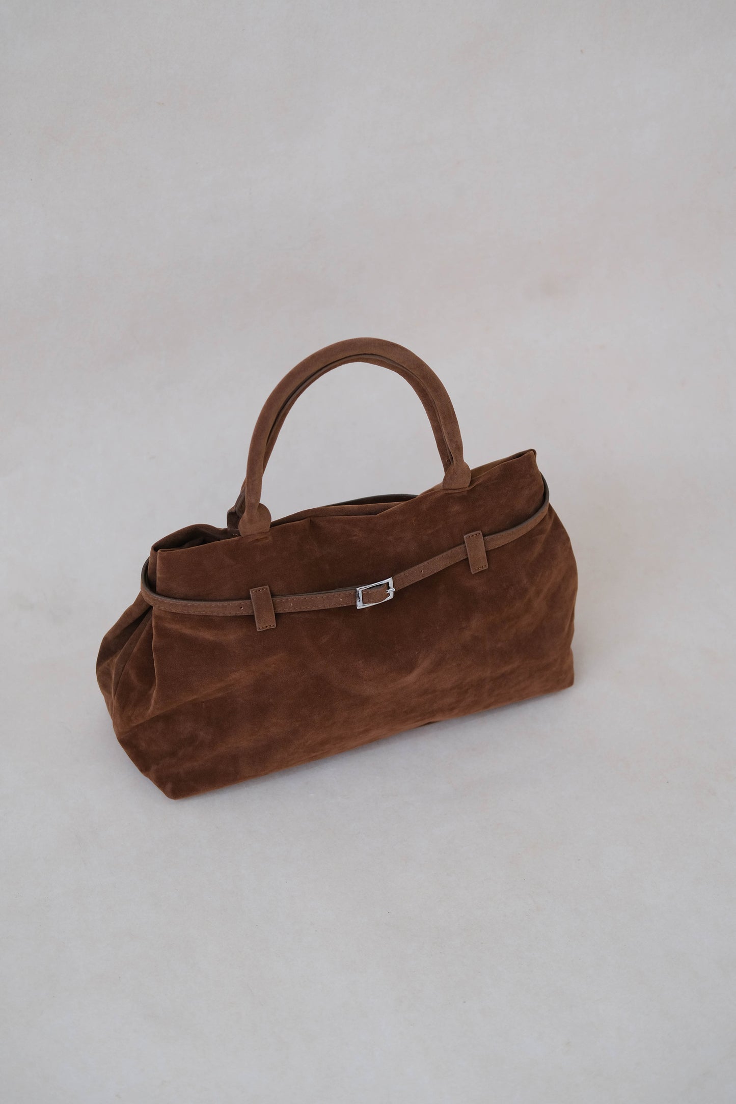 The Elegant Suede Bag In Dark Brown