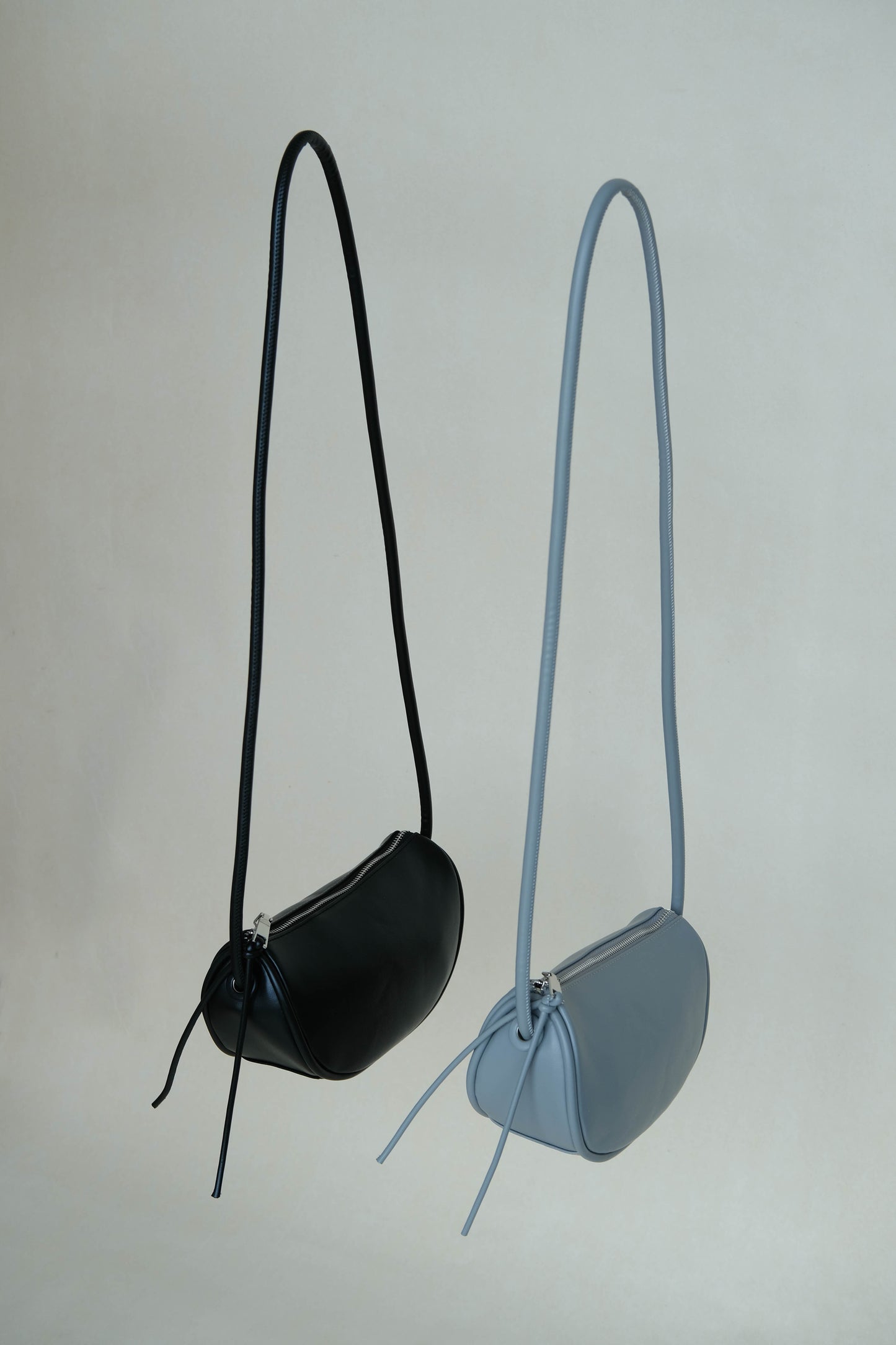 Half-moon saddle shoulder bag in grey blue
