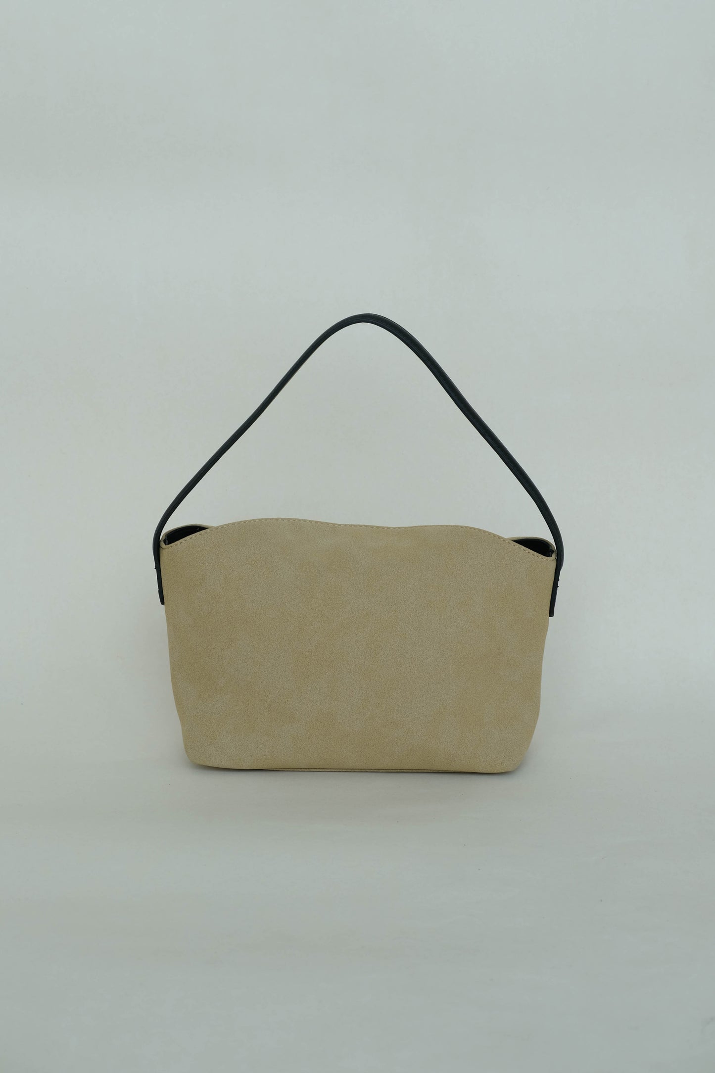 Matte finish single-strap shoulder bag in apricot color