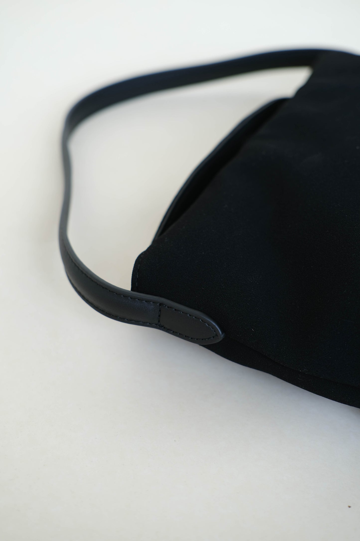 Matte finish single-strap shoulder bag in classic black