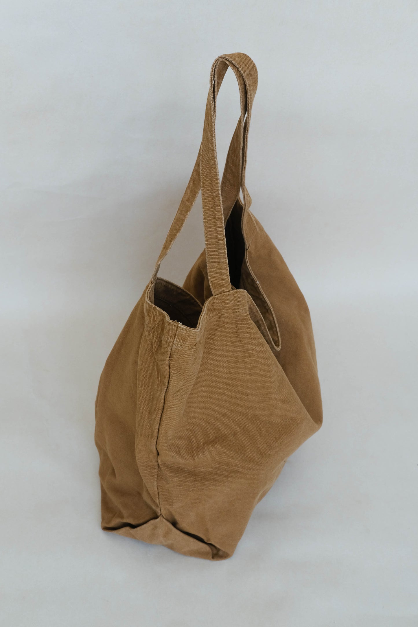 Korean style canvas large capacity shoulder bag in brown