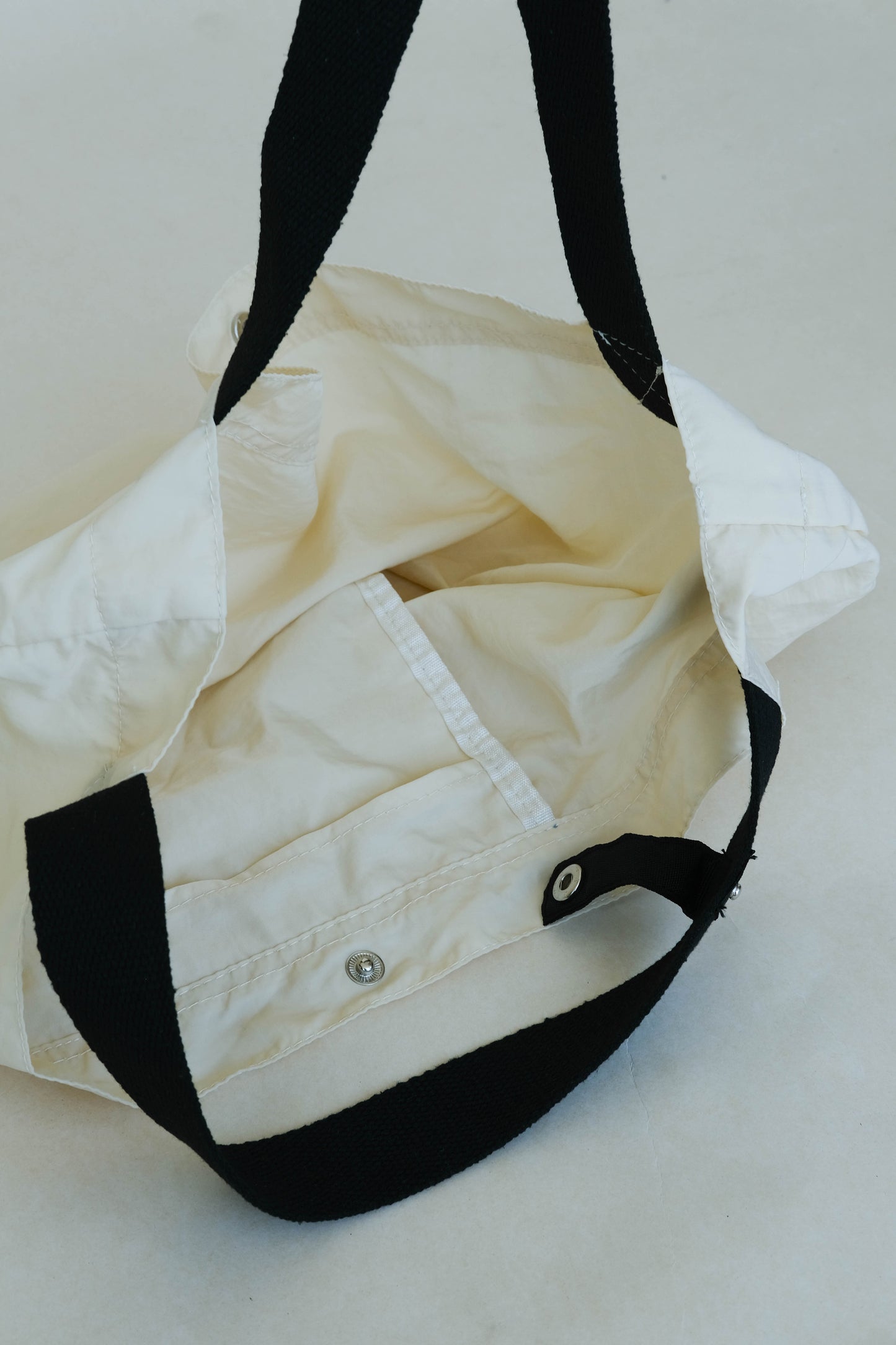 Large capacity nylon cloth shoulder bag in off white color