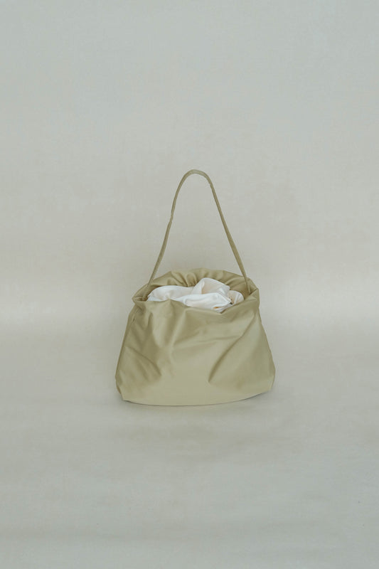 French nylon cloud pleated shoulder bag in apricot