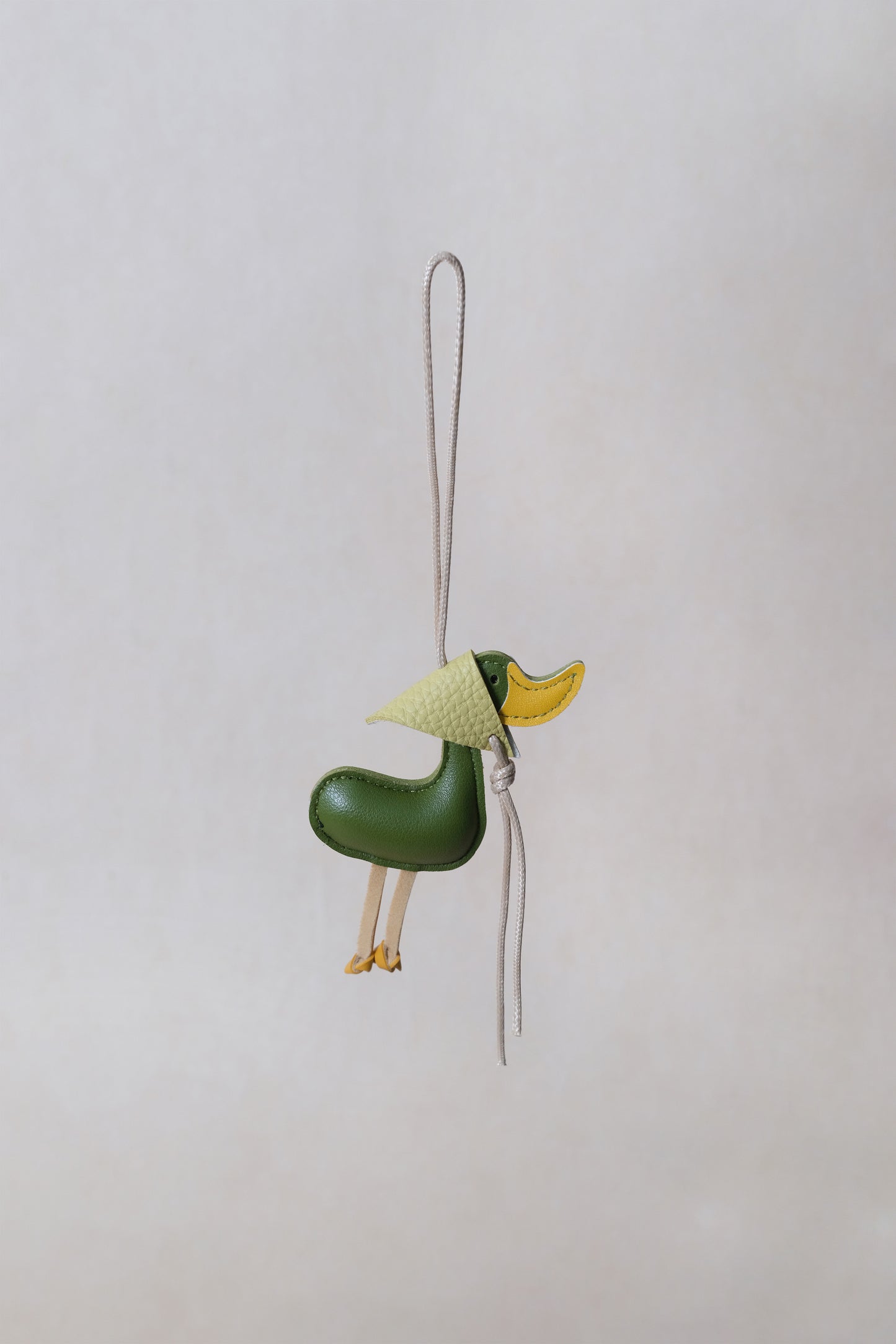 Lucky Duck Charm – Dark Green Duck, Yellow Hat
