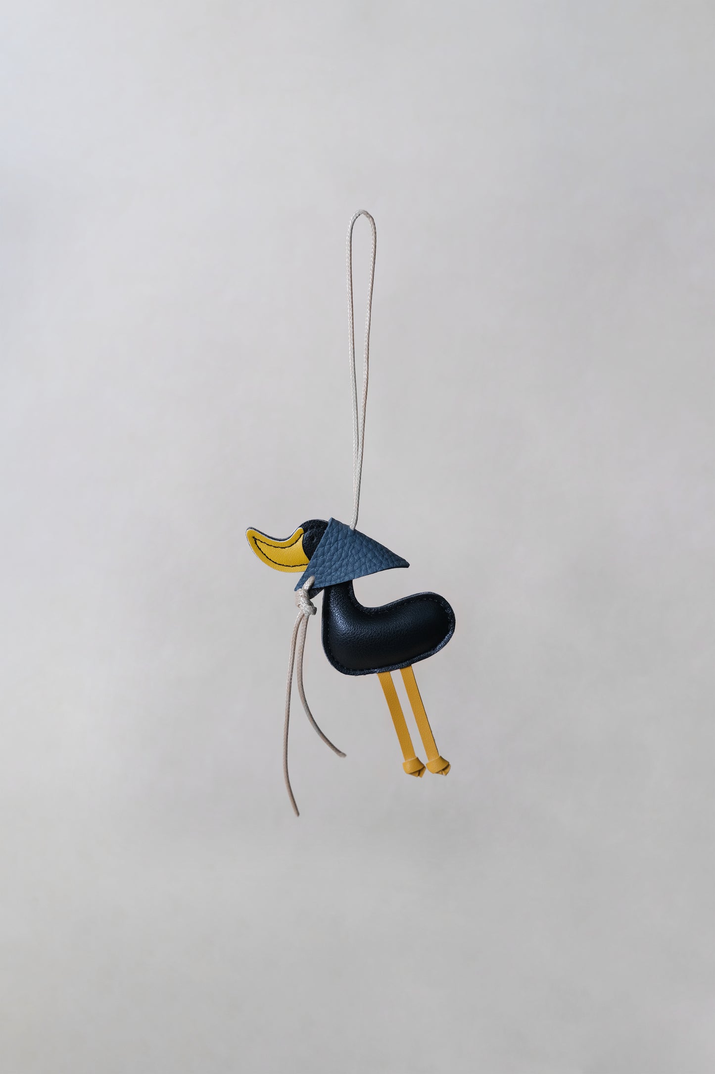 Lucky Duck Charm – Black Duck, Dark Blue Hat