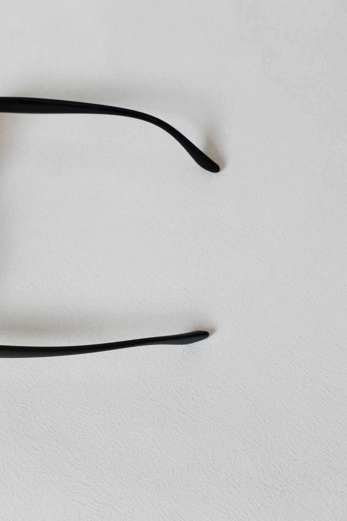 Lumière Oval Sunglasses - Black Frame + Brown Lenses