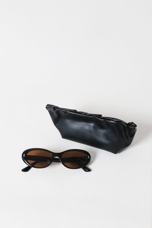 Lumière Oval Sunglasses - Black Frame + Brown Lenses