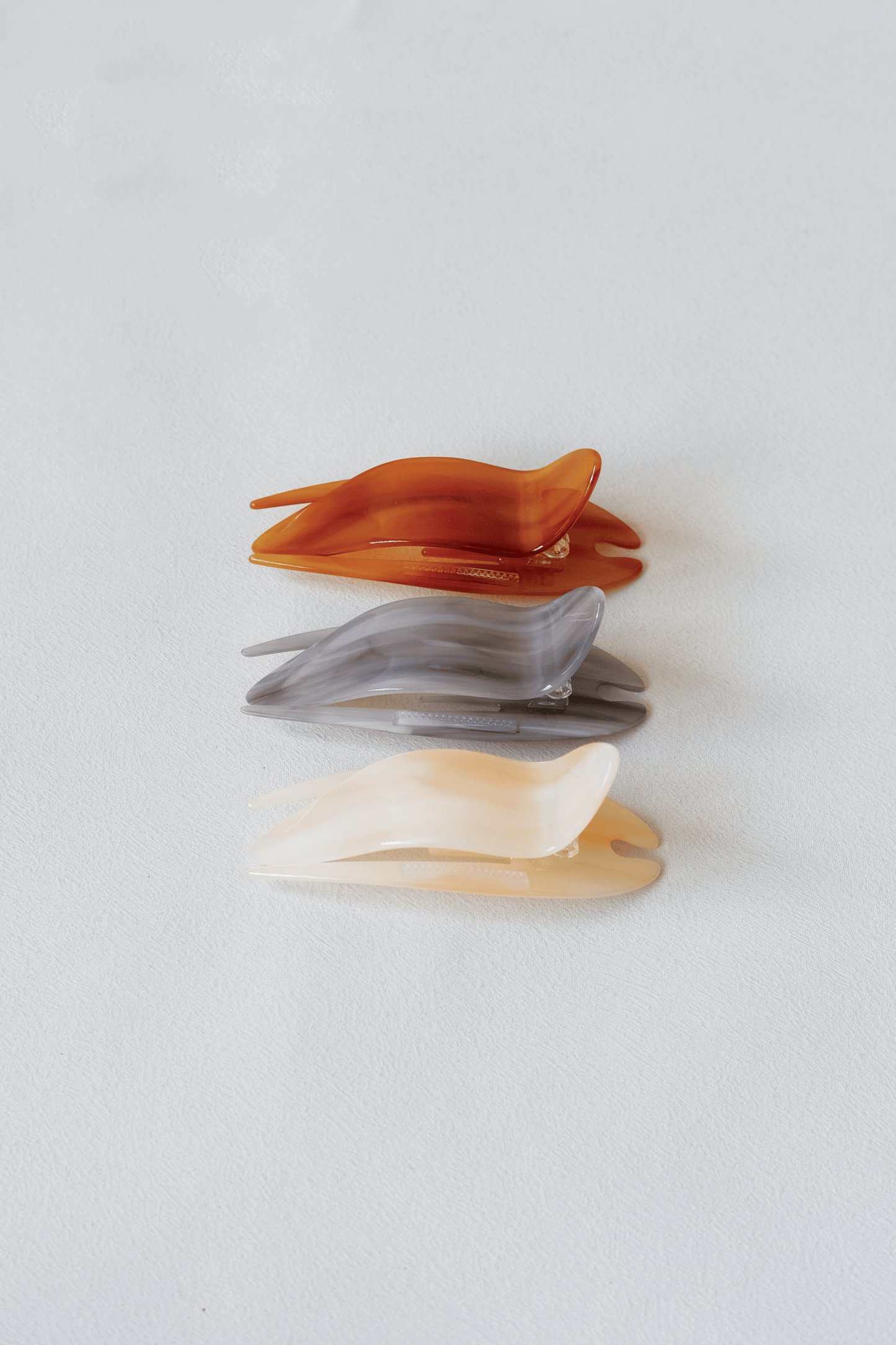 Lumière Tail Clip - Pink Orange