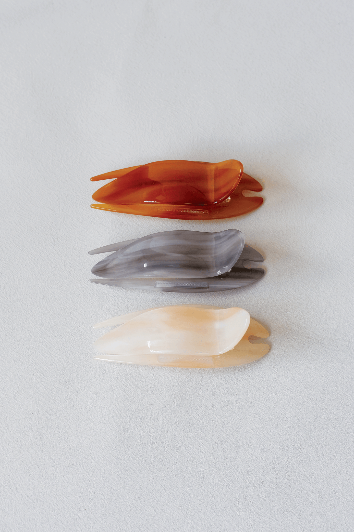 Lumière Tail Clip - Pink Orange