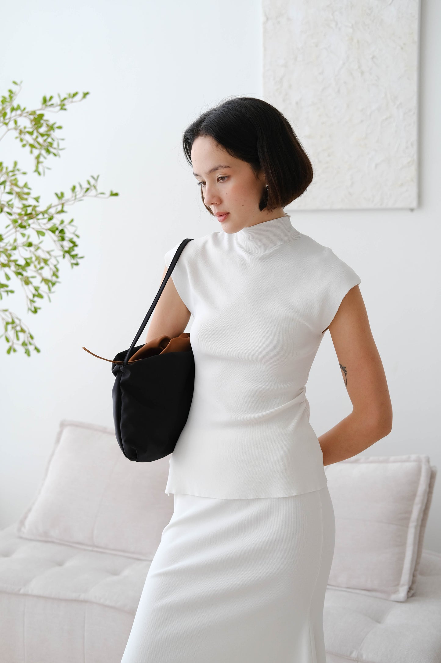 Stand collar top with sleeves in snow white color