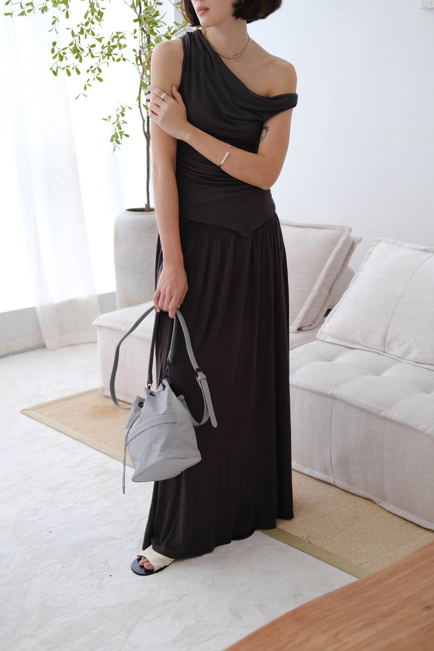 Wide waistband pleated knitted skirt in Soot color