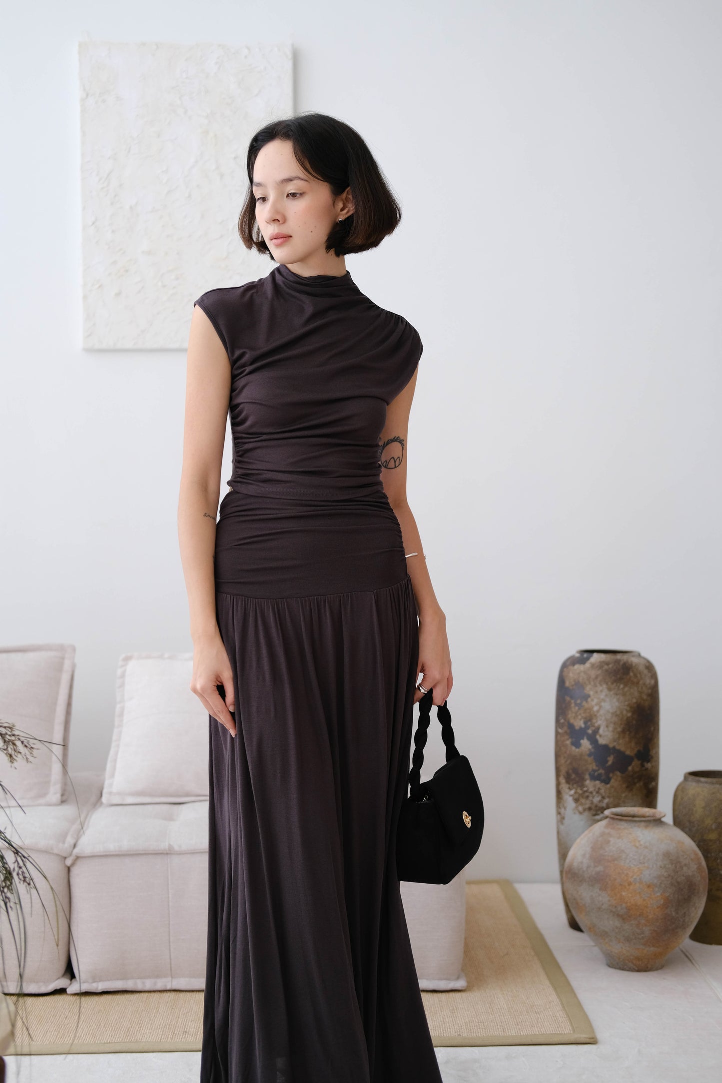 Wide waistband pleated knitted skirt in Soot color