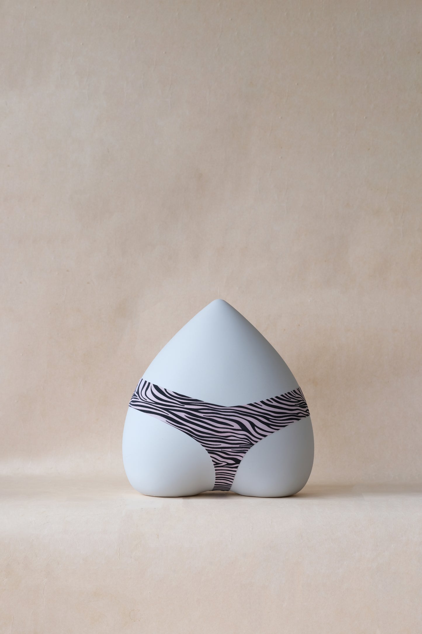 The Sleek Whisper Thong - Ivory Zebra Print