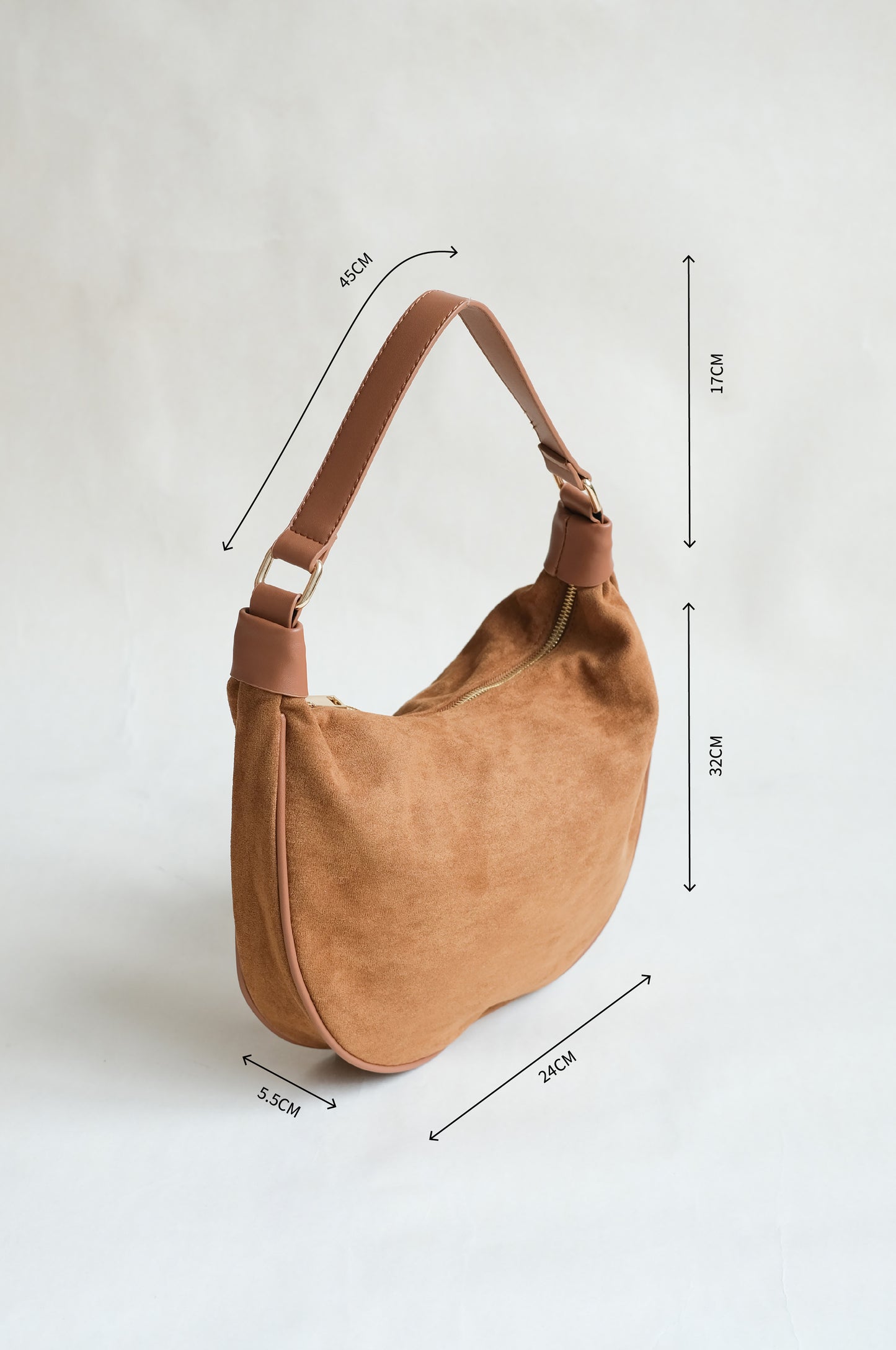 Underarm saddle dumpling bag in brown color