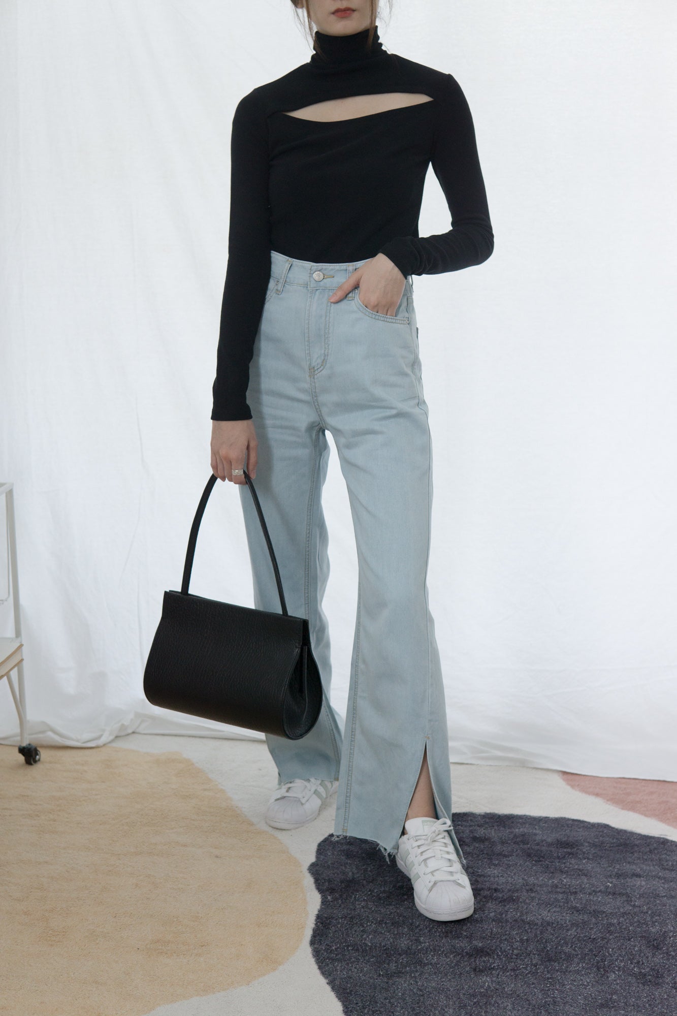 Denim trousers with slits