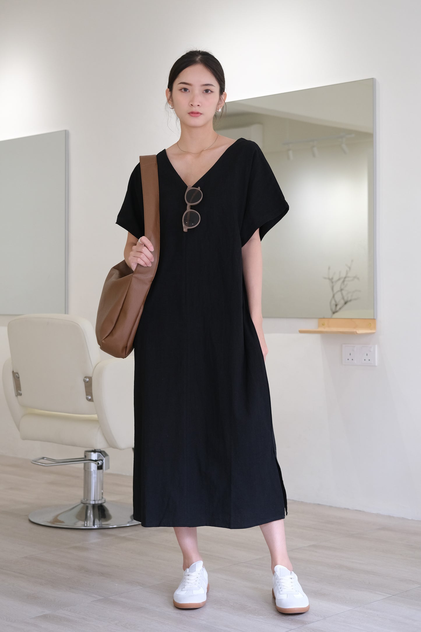 Long, loose short-sleeved dress in classic black