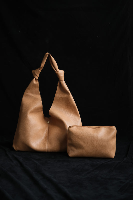 Vintage hand-held shoulder bag in brown