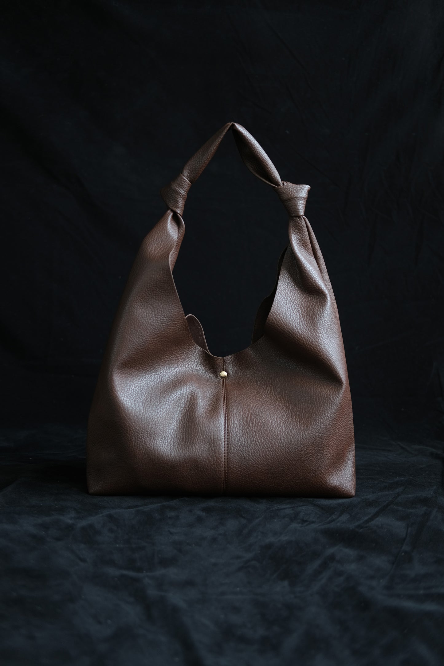 Vintage hand-held shoulder bag in coffee color