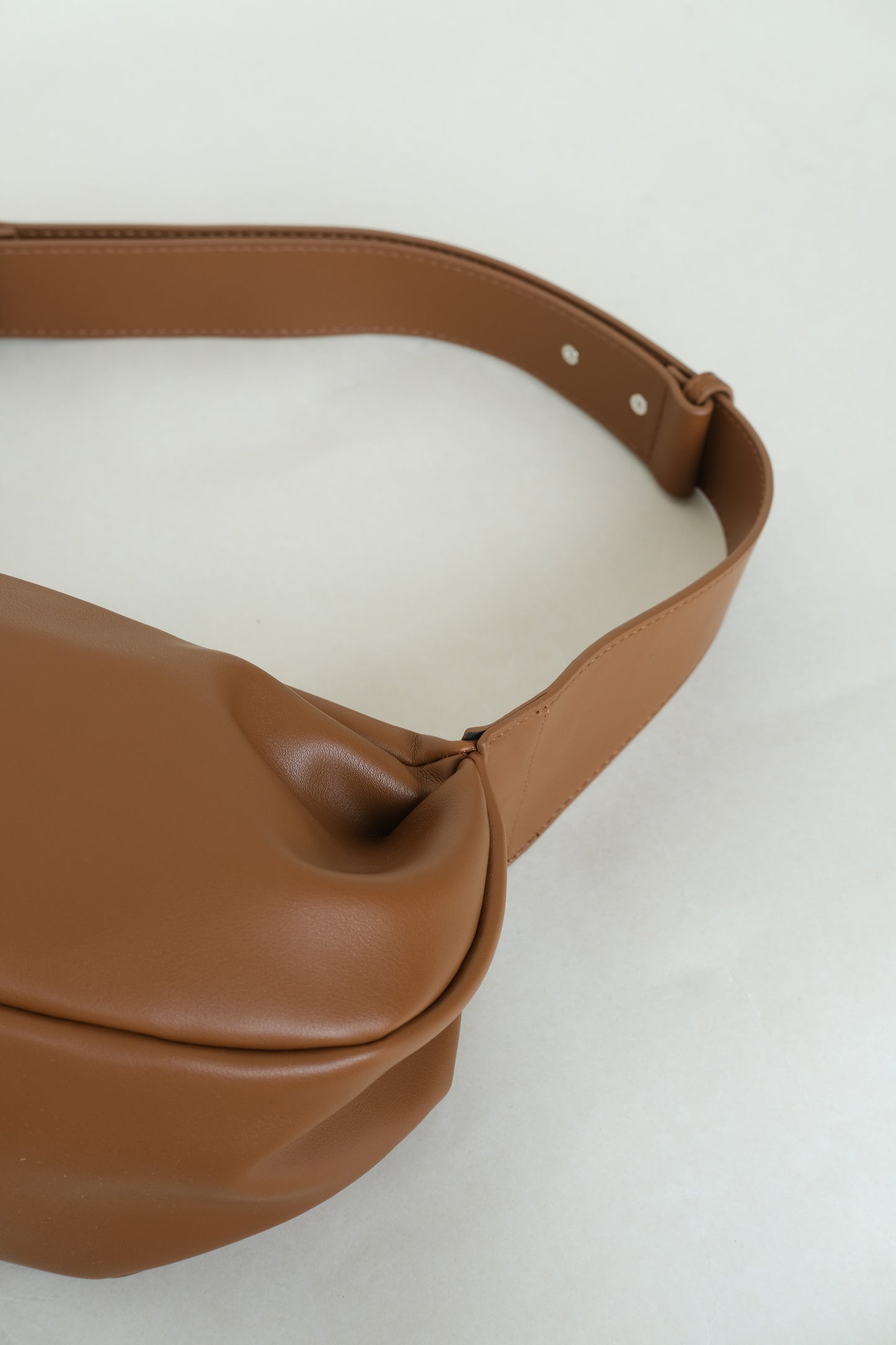 PU soft leather pillow bag in brown