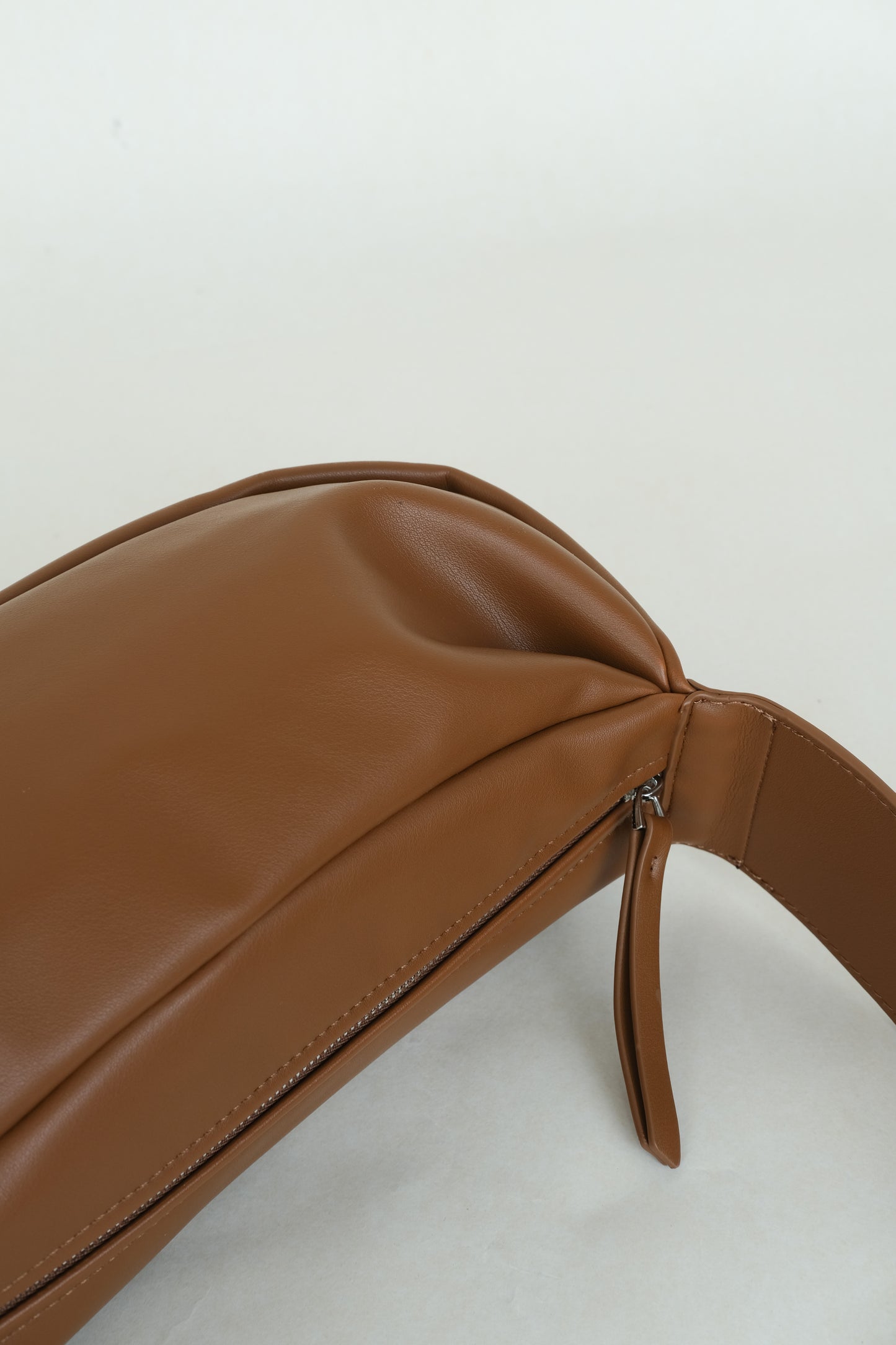 PU soft leather pillow bag in brown