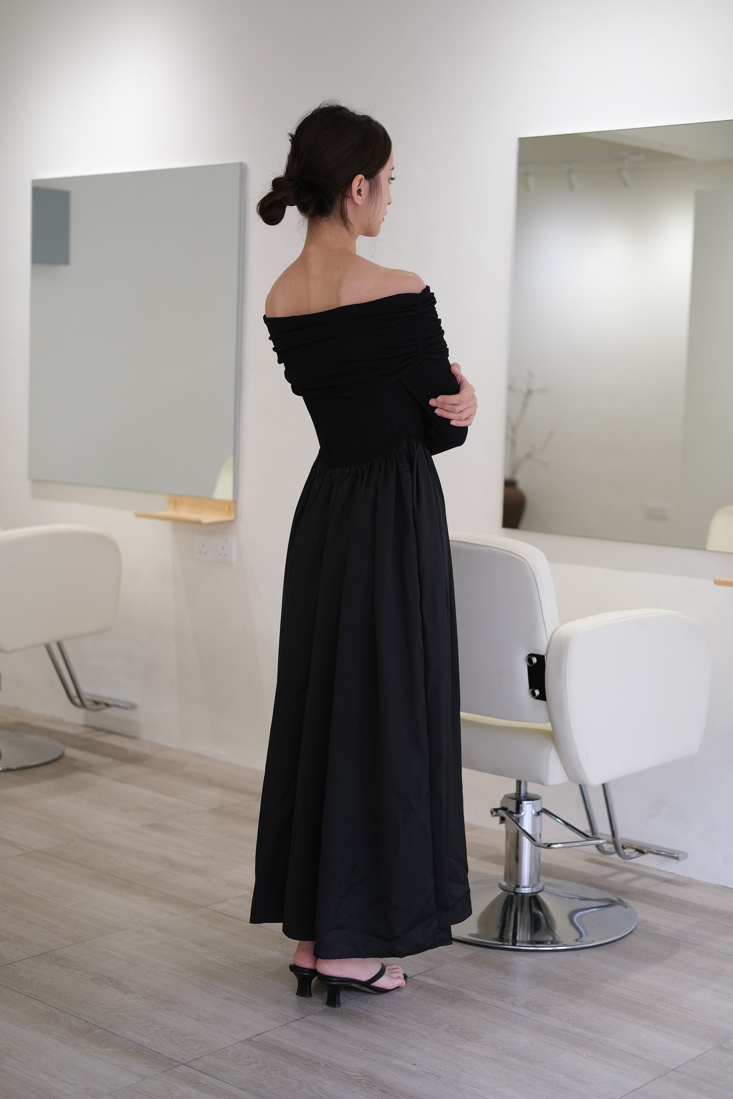 Off-the-shoulder long-sleeved dress in classic black