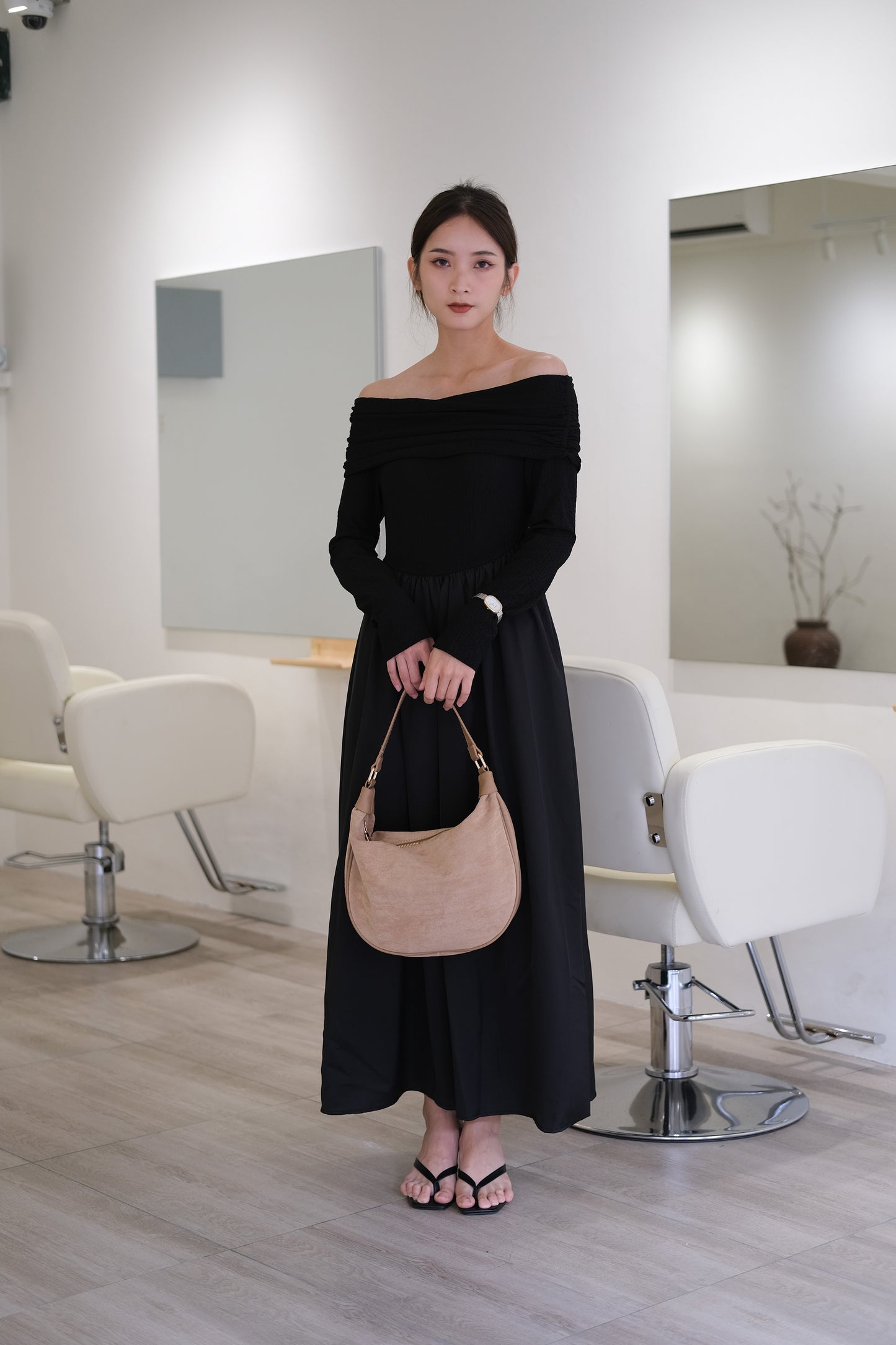 Off-the-shoulder long-sleeved dress in classic black