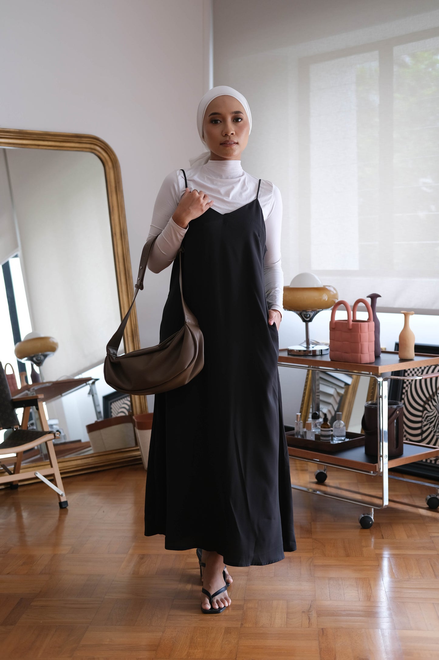 V-neck long sleeveless slip dress in classic black
