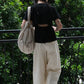 Loose and Slim Drape Slacks in Cream White