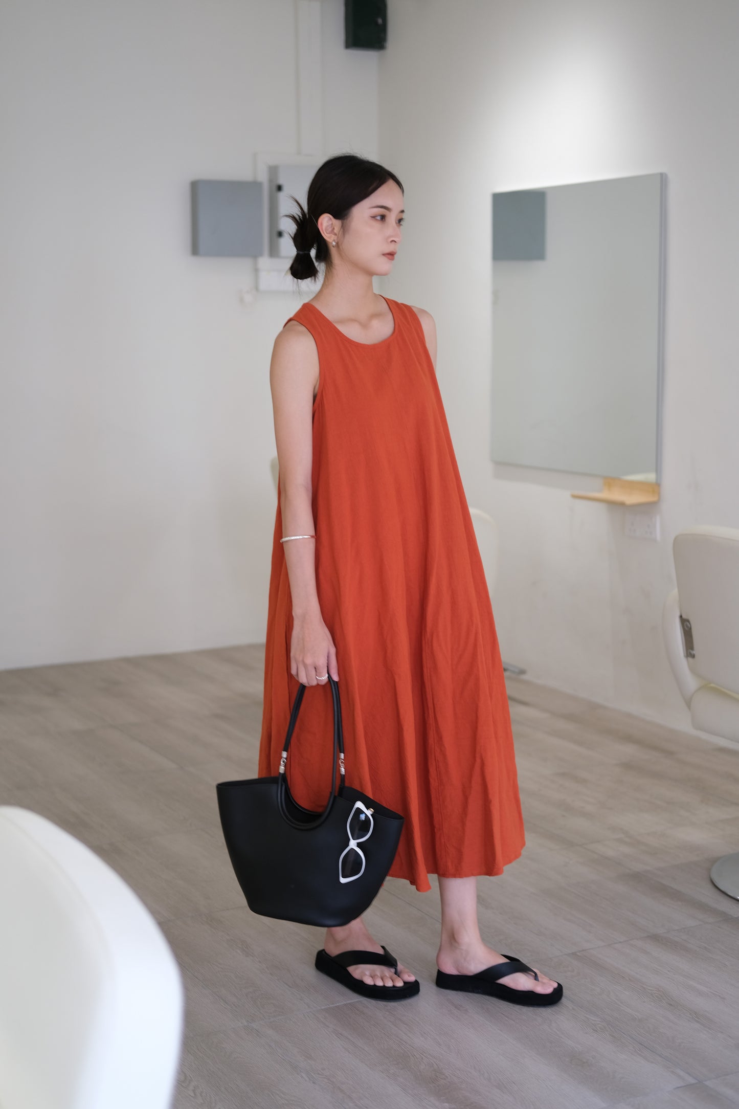 Sleeveless cotton and linen dress in brick red