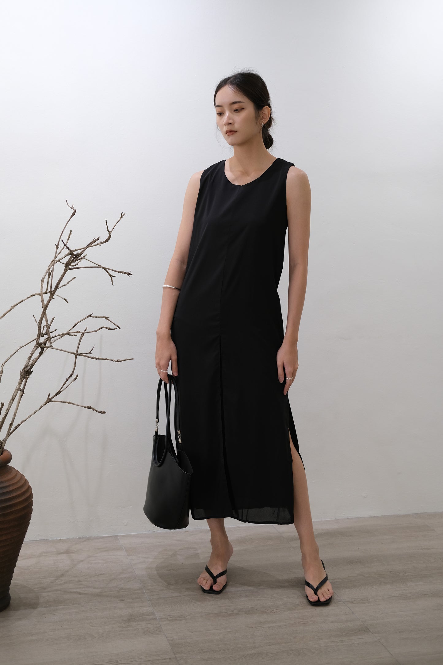 Simple sleeveless vest dress in classic black