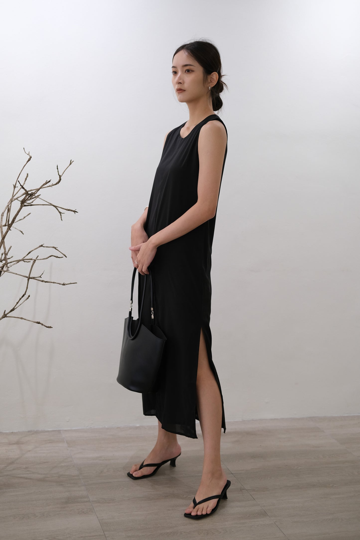 Simple sleeveless vest dress in classic black