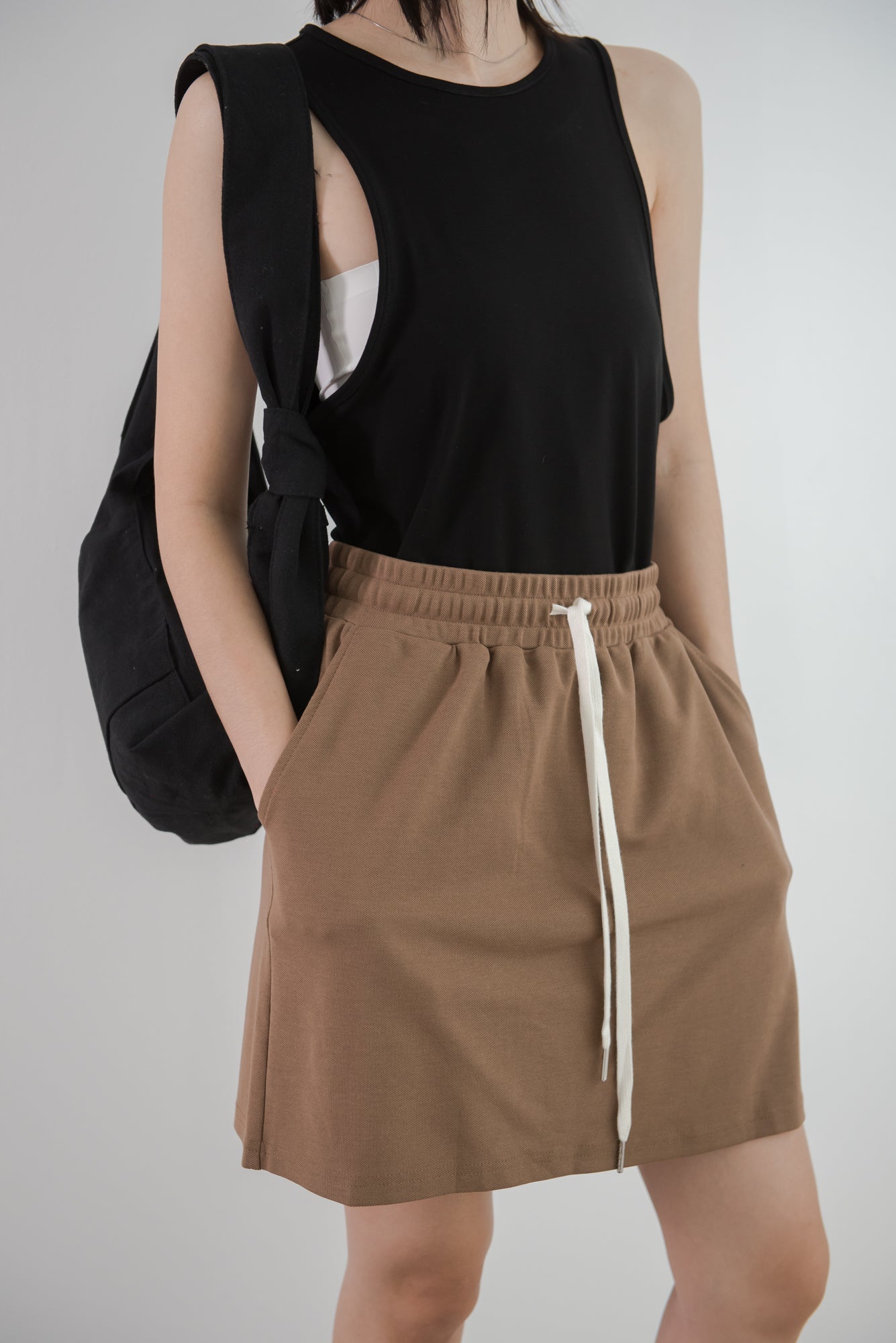Drawstring design sense a-line short skirt in coffee